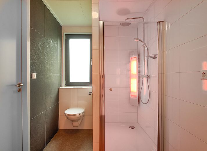 Gezellige zithoek in De Vlinderhoeve, een luxe bungalow in Kring van Dorth, Achterhoek, Gelderland.