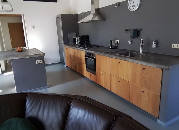 Vacation cottage in Voorst, Gelderland, surrounded by flowering trees in the Achterhoek.