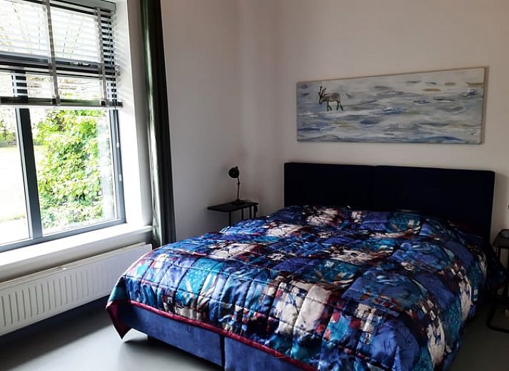 Cozy living room of cottage in Voorst, Achterhoek, overlooking the garden.