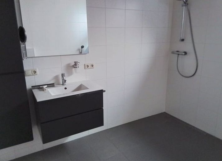 Cozy living room of cottage in Voorst, Achterhoek, overlooking the garden.