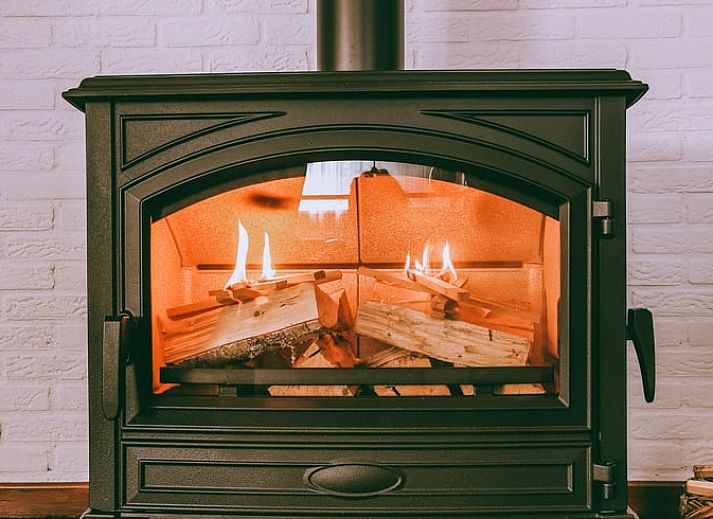 Attractive bedroom in Cottage in Voorst, Oude IJsselstreek, with artistic wall decorations and cozy furnishings, Achterhoek, Gelderland.