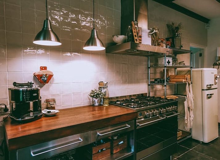 Attractive bedroom in cottage in Voorst, Oude IJsselstreek, Achterhoek, Gelderland, with stylish decor and comfortable beds.