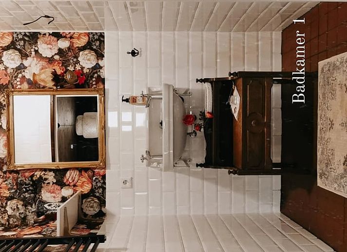 Attractive bedroom in cottage in Voorst, Oude IJsselstreek, Achterhoek, with vintage lamp and luxury bedding, ideal vacation home in Gelderland.