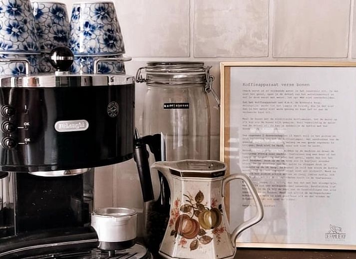 Attractive bedroom in cottage in Voorst, Oude IJsselstreek, Achterhoek, with vintage lamp and luxury bedding, ideal vacation home in Gelderland.