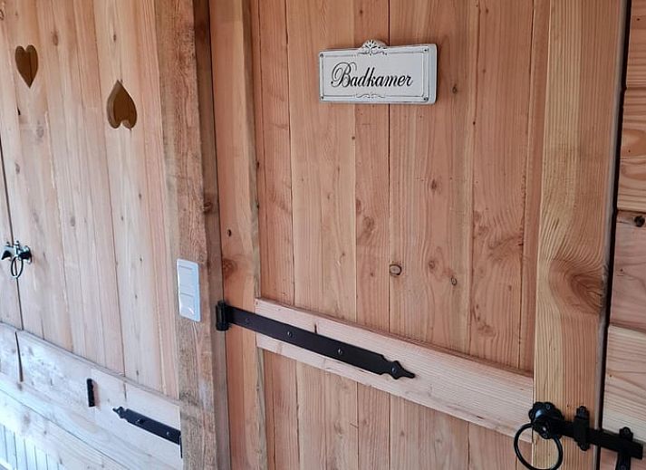 Welcome sign at Holiday Home in Winterswijk Corle, an inviting vacation home in the Achterhoek.