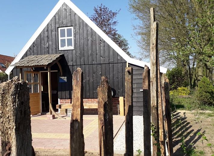 Charmantes Ferienhaus in Winterswijk Corle, Achterhoek, Gelderland, mit laendlicher Atmosphaere und rustikaler Veranda.