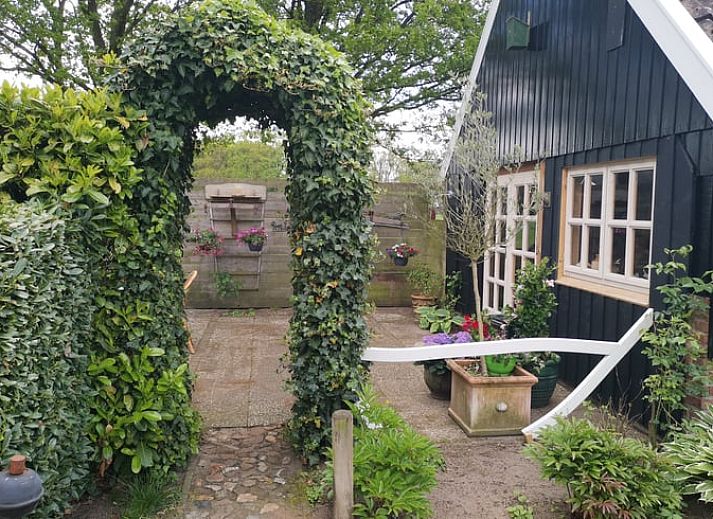 Charmantes Ferienhaus in Winterswijk Corle, Achterhoek, Gelderland, mit laendlicher Atmosphaere und rustikaler Veranda.