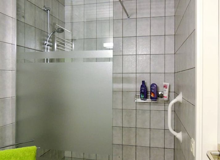 Cozy living room in Holiday Home in Winterswijk Corle, Achterhoek, Gelderland, with comfortable seating area and modern furnishings.