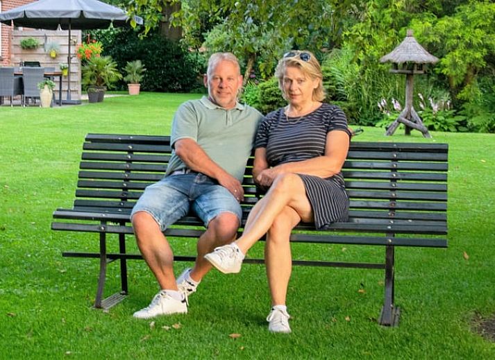 Cozy living room in Holiday Home in Winterswijk Corle, Achterhoek, Gelderland, with comfortable seating area and modern furnishings.