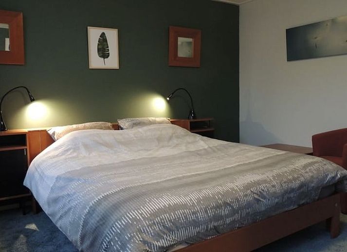 Cozy living room in Holiday home in Winterswijk Corle overlooking the green surroundings in Achterhoek, Gelderland.