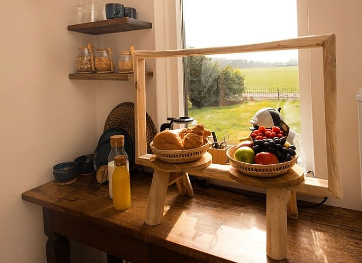 Romantic bedroom in Holiday Home in Wilp-Achterhoek with towel swans on the bed.