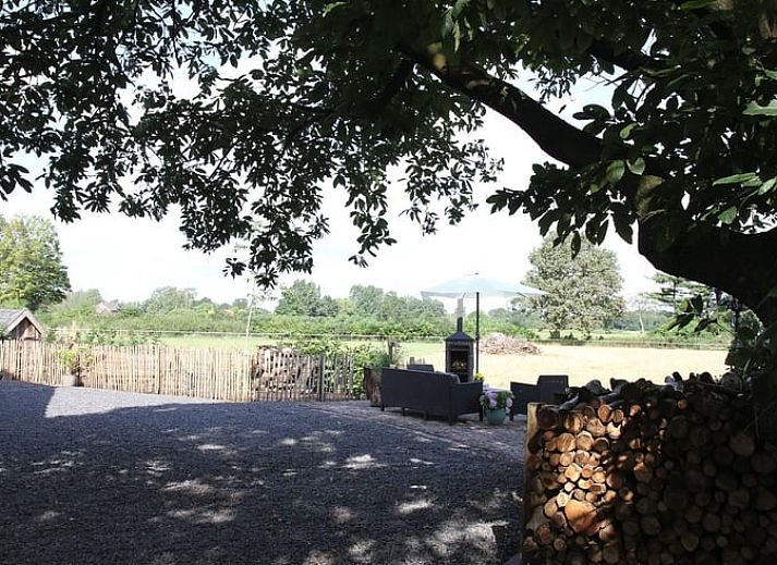 Vakantiehuis in Zieuwent, Achterhoek, Gelderland met charmant terras en groene omgeving voor een ontspannen verblijf.
