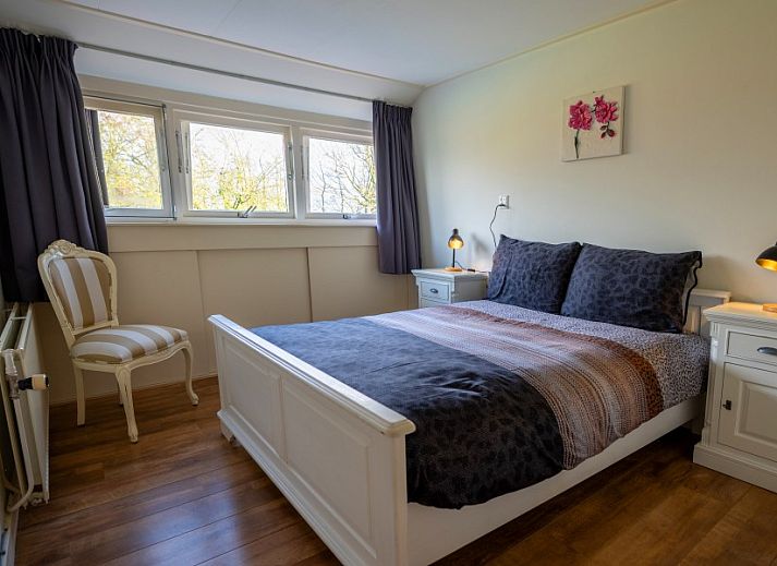 Speeltuin met trampoline bij Groepsaccommodatie Dickenes, vakantiehuis in Bennekom, Veluwe.