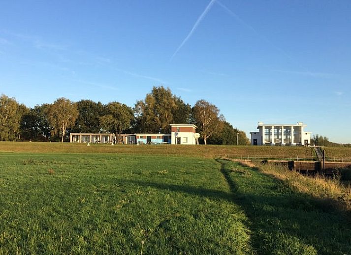 Cozy living room in Cottage in Bronkhorst, vacation home in Gelderse Valley with modern interior and natural light.