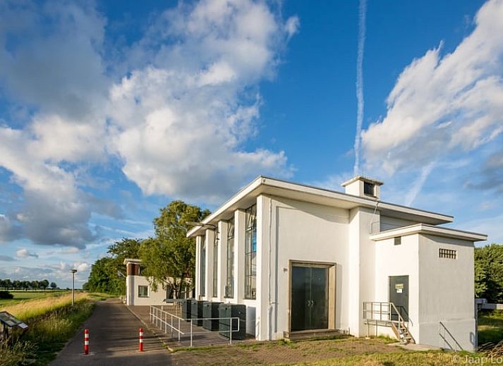 Cozy living room in Cottage in Bronkhorst, vacation home in Gelderse Valley with modern interior and natural light.
