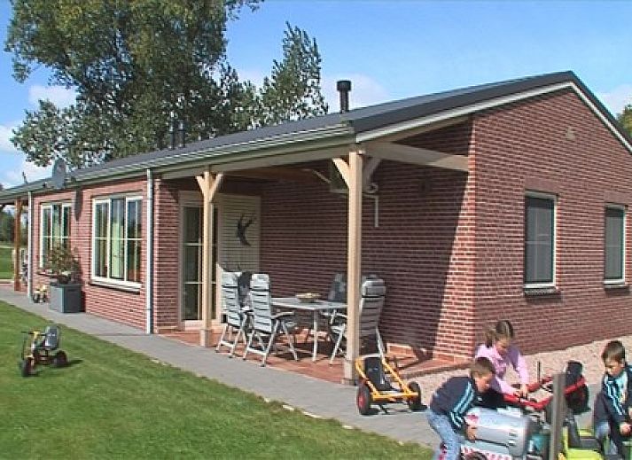 Ferienhaus Foxheuvel in Didam, Gelderland, mit grossem Garten und gemuetlicher Veranda.
