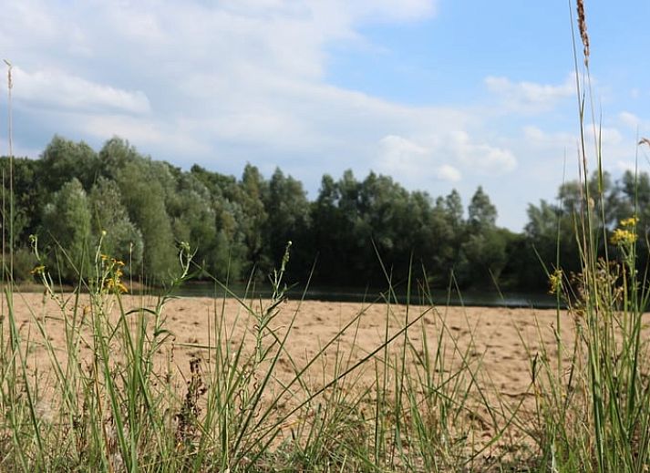 Gemuetliches Interieur von Huisje in Netterden, einem Ferienhaus in Montferland, Gelderland, mit bequemen Betten und einer schoenen Essecke.