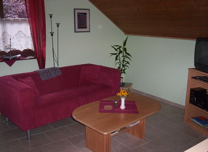 Vakantiewoning in Beek-Montferland, Gelderland met charmante bakstenen gevel en balkon.