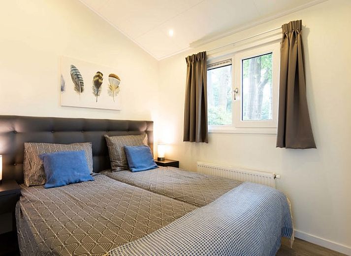 Ferox XL Ferienhaus fuer 5 Personen in Beekbergen, Veluwe, mit sonniger Terrasse und gruenem Garten, ideal zum Entspannen in Gelderland.