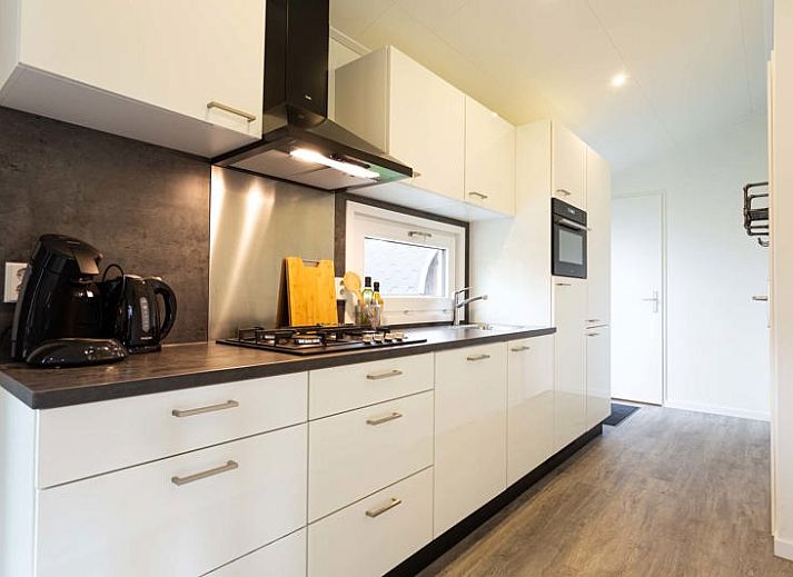 Ferox XL Ferienhaus fuer 5 Personen in Beekbergen, Veluwe, mit sonniger Terrasse und gruenem Garten, ideal zum Entspannen in Gelderland.