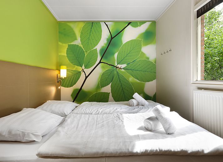 Gemuetliches Wohnzimmer mit Kamin in Heideheuvel 6-Personen-Bungalow Beekbergen Veluwe