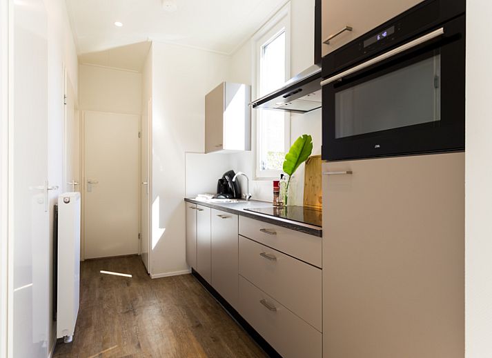 Gemuetliches Schlafzimmer im Modul Special 6 Personen Wellness, Ferienhaus in Beekbergen, Veluwe, Gelderland mit bequemen Betten.