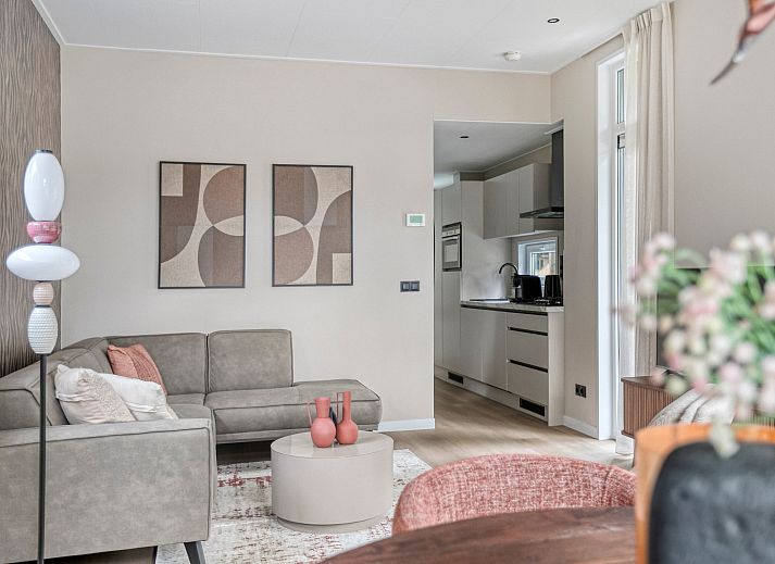 Auenansicht des Ferienhauses Wilgenhof in Ede, Veluwe, mit groer Terrasse und umliegender Natur.