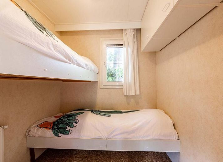 Holiday Home 4 personen in Ede, Veluwe, Gelderland met gezellig terras en groene omgeving.