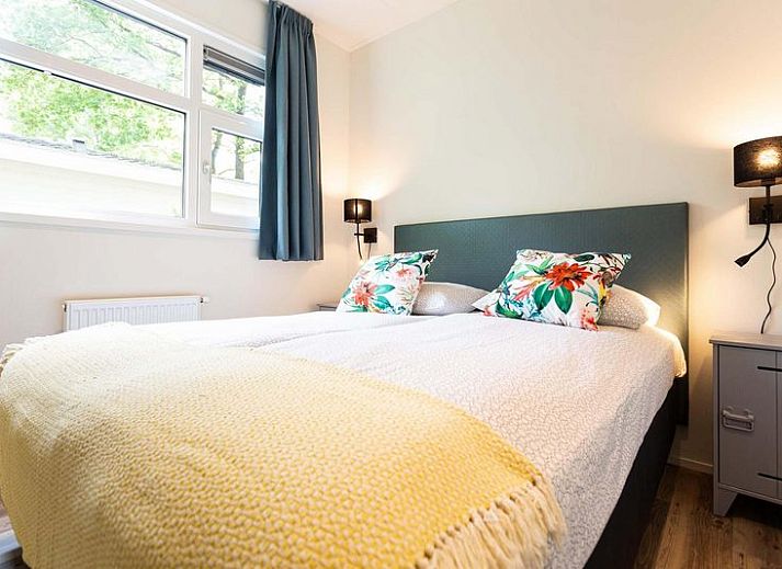 Module Special 4 personen Wellness in Ede, Veluwe met hottub op het terras omringd door groene natuur.