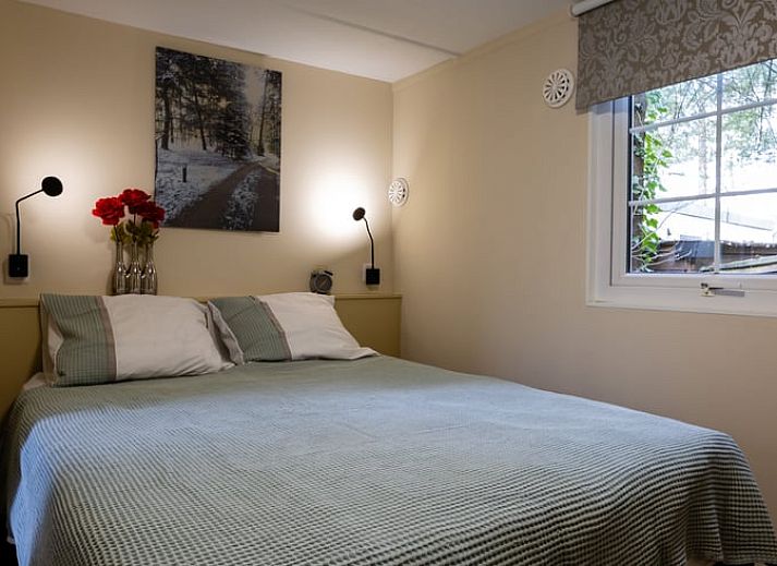 Spacious living room in Holiday Home in Emst, Veluwe, with lots of natural light.
