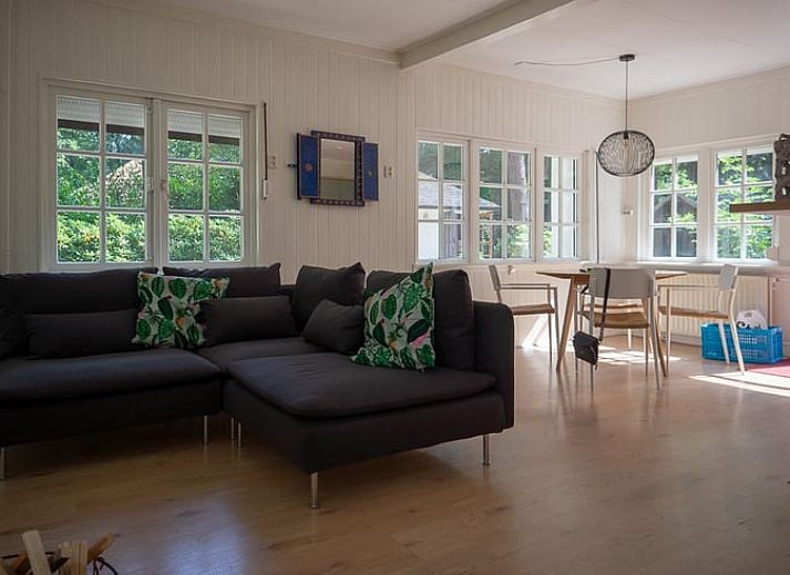 Vacation home in Emst, Veluwe, Gelderland surrounded by green nature and rustic charm, ideal for a relaxing stay.