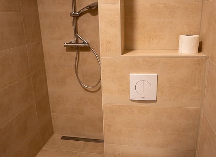 Cozy living room of Holiday home in Emst, Veluwe, with modern decor and lots of natural light in Gelderland.