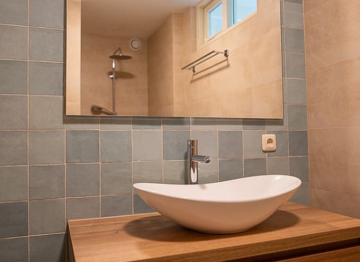 Cozy living room of Holiday home in Emst, Veluwe, with modern decor and lots of natural light in Gelderland.