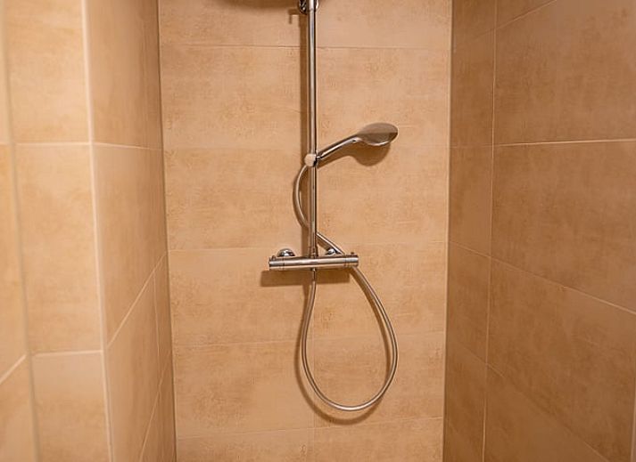 Cozy living room of Holiday home in Emst, Veluwe, with modern decor and lots of natural light in Gelderland.