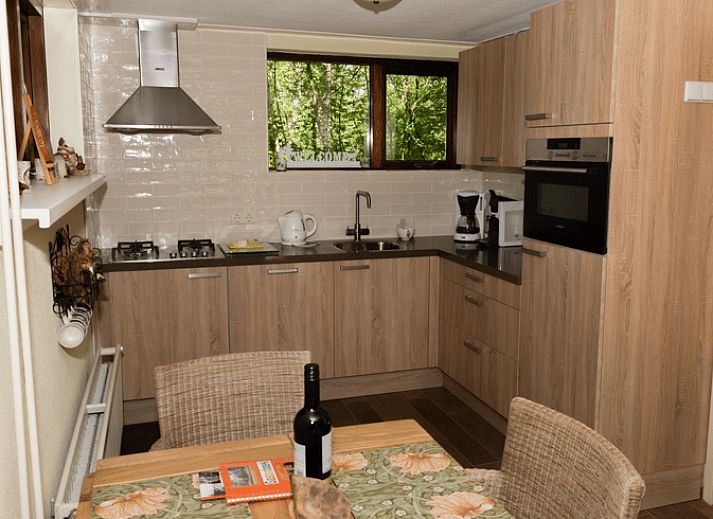 Vacation cottage in Emst with spacious terrace, perfect for outdoor activities in the Veluwe.