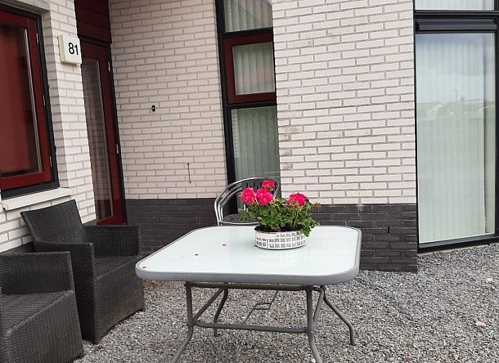 Binnenruimte van Aledo Veluwe aan Zee Strand Horst, Ermelo, Gelderland. Gezellige zithoek met uitzicht op de omgeving.