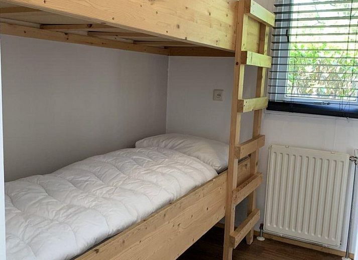 Charmante Glamping Lodge Tiny Lodge in Harderwijk, Veluwe, Gelderland, umgeben von viel Gruen und Ruhe.