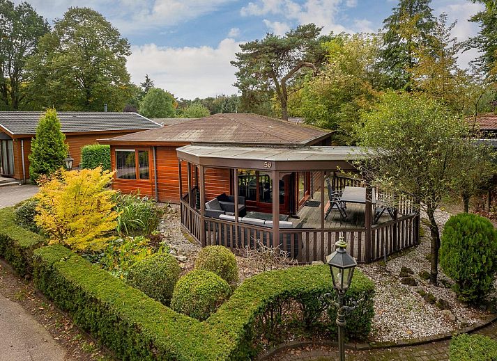 Veluwe Lodge in Harderwijk, Gelderland with spacious veranda and green surroundings