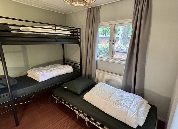 Terrace with seating at Cozy Lodge vacation home in Harderwijk, Veluwe, Gelderland.