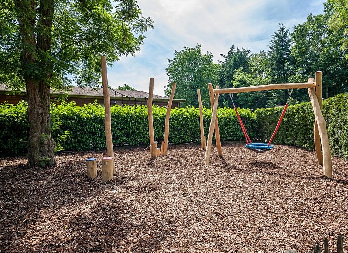 Cycling at Cozy Lodge vacation home in Harderwijk, Veluwe, Gelderland with green surroundings.