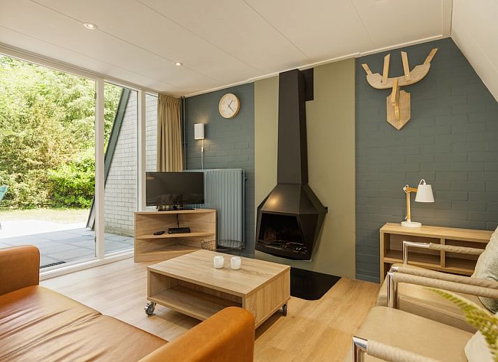 Veluwe Villa 4B in Hoenderloo, Veluwe, Gelderland, umgeben von gruener Natur und einer rustikalen Atmosphaere.