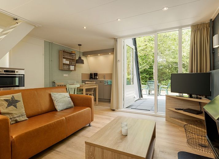 Veluwe Villa 4B in Hoenderloo, Veluwe, Gelderland, umgeben von gruener Natur und einer rustikalen Atmosphaere.