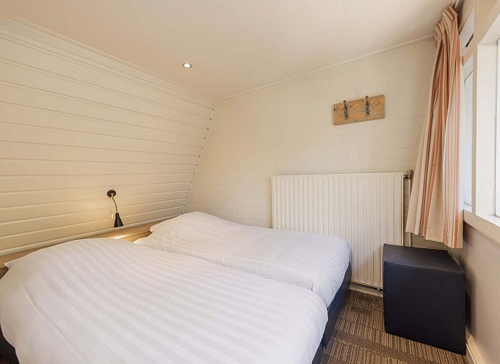 Vrijstaande woning in Hoenderloo op de Veluwe, omgeven door groene natuur in Gelderland, ideaal vakantiehuis voor rust en ontspanning.