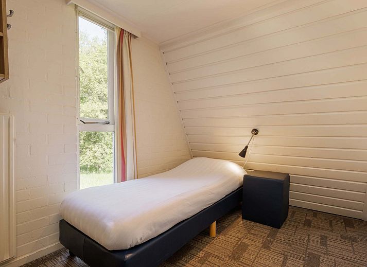 Vrijstaande woning in Hoenderloo op de Veluwe, omgeven door groene natuur in Gelderland, ideaal vakantiehuis voor rust en ontspanning.