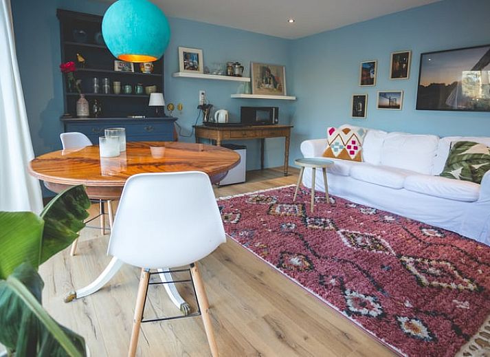 Vakantiehuisje in Hoenderloo gelegen in de Veluwe, omgeven door weelderige natuur en rustgevende bossen.