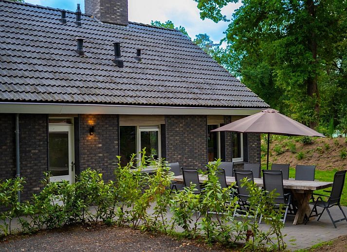 Group accommodation Specht in Hoenderloo, Veluwe. Vacation home with terrace surrounded by nature in Gelderland.