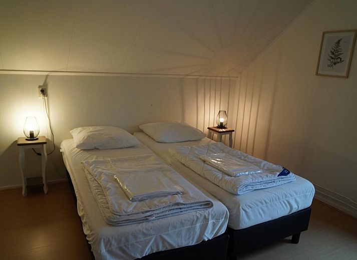 Outdoor area of Group Accommodation Specht in Hoenderloo, Veluwe. Vacation home with spacious seating area in Gelderland.