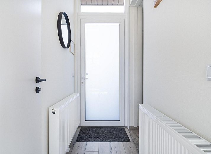 Family enjoys the pond at Holiday home Deerhoeve comfort in Hoenderloo, Veluwe. Perfect for relaxation and nature.