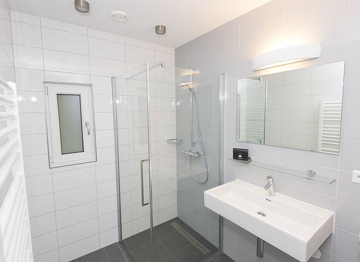 Spacious living room of Miggelenberg bungalow in Hoenderloo, Veluwe, Gelderland with lots of light.