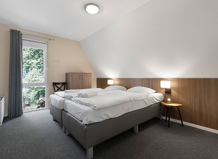 Stylish bathroom in Miggelenberg bungalow, Hoenderloo, Veluwe, Gelderland with glass shower.